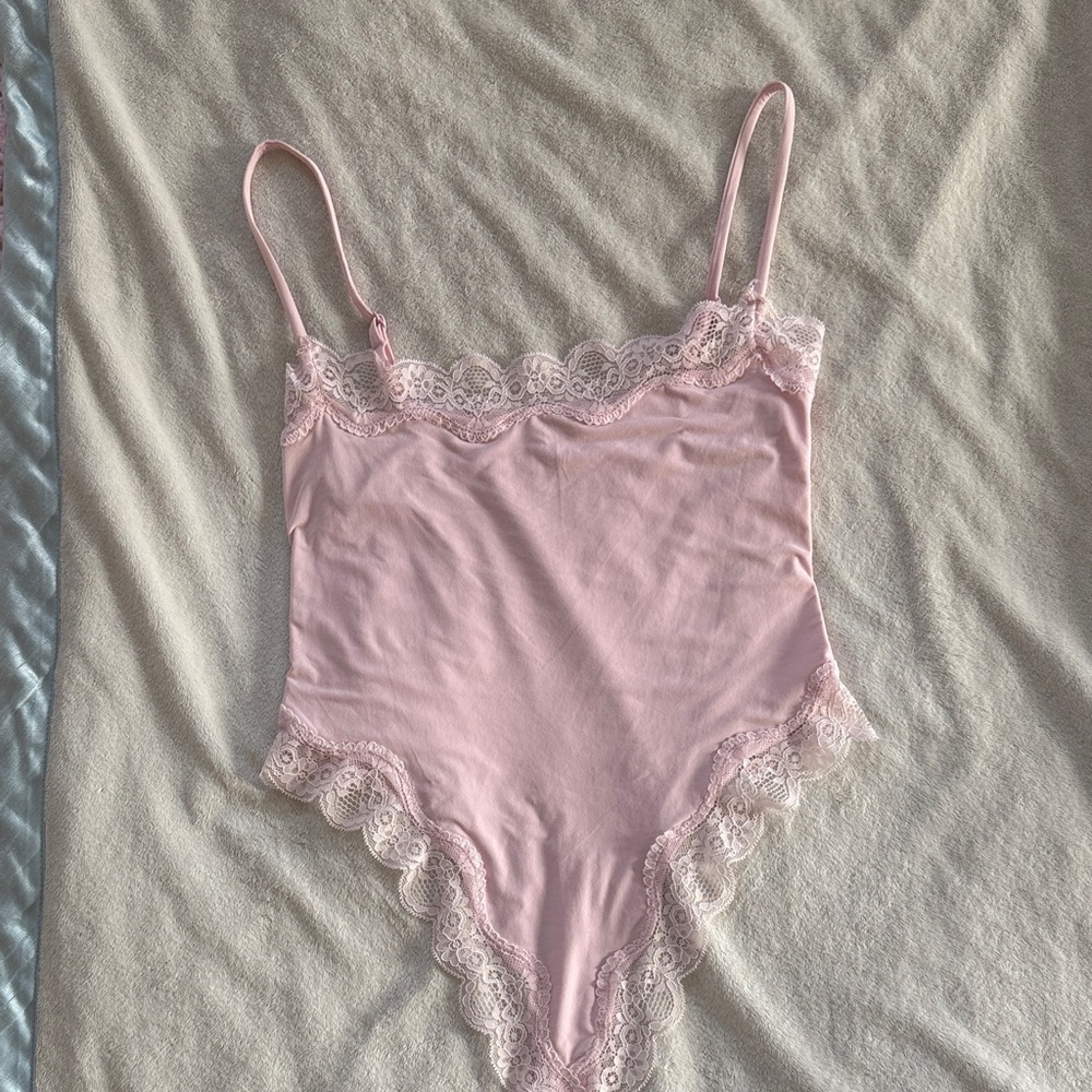 Elegant Pink Lace Trim Bodysuit